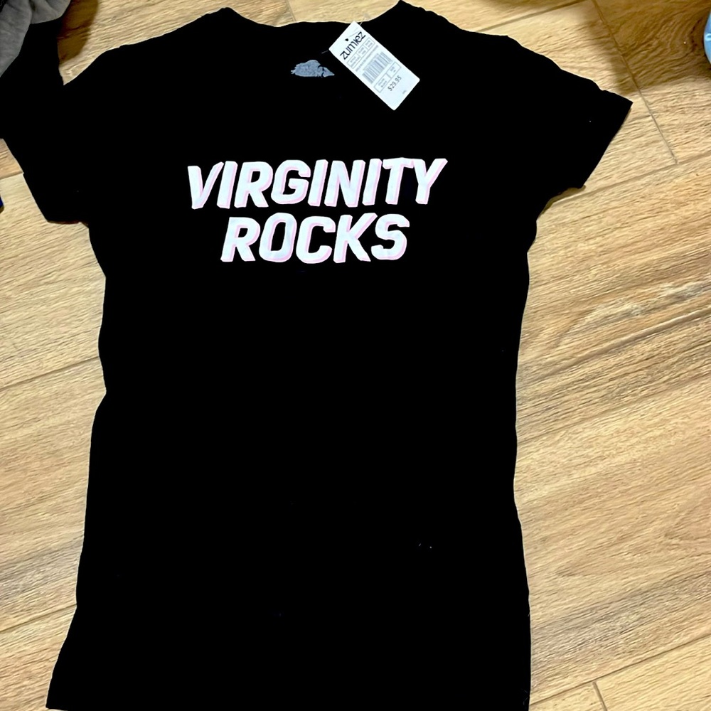 Black (virginity rocks) shirt wording are colors white and baby pink